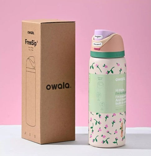 32-ounce Owala FreeSip insulated stainless steel water bottle in the "Tea Time" floral design.