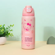 32-ounce Owala FreeSip insulated stainless steel water bottle featuring a Hello Kitty theme in a light pink color.