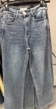 Laulia jeans feature a wide-leg design and a high-waist fit.