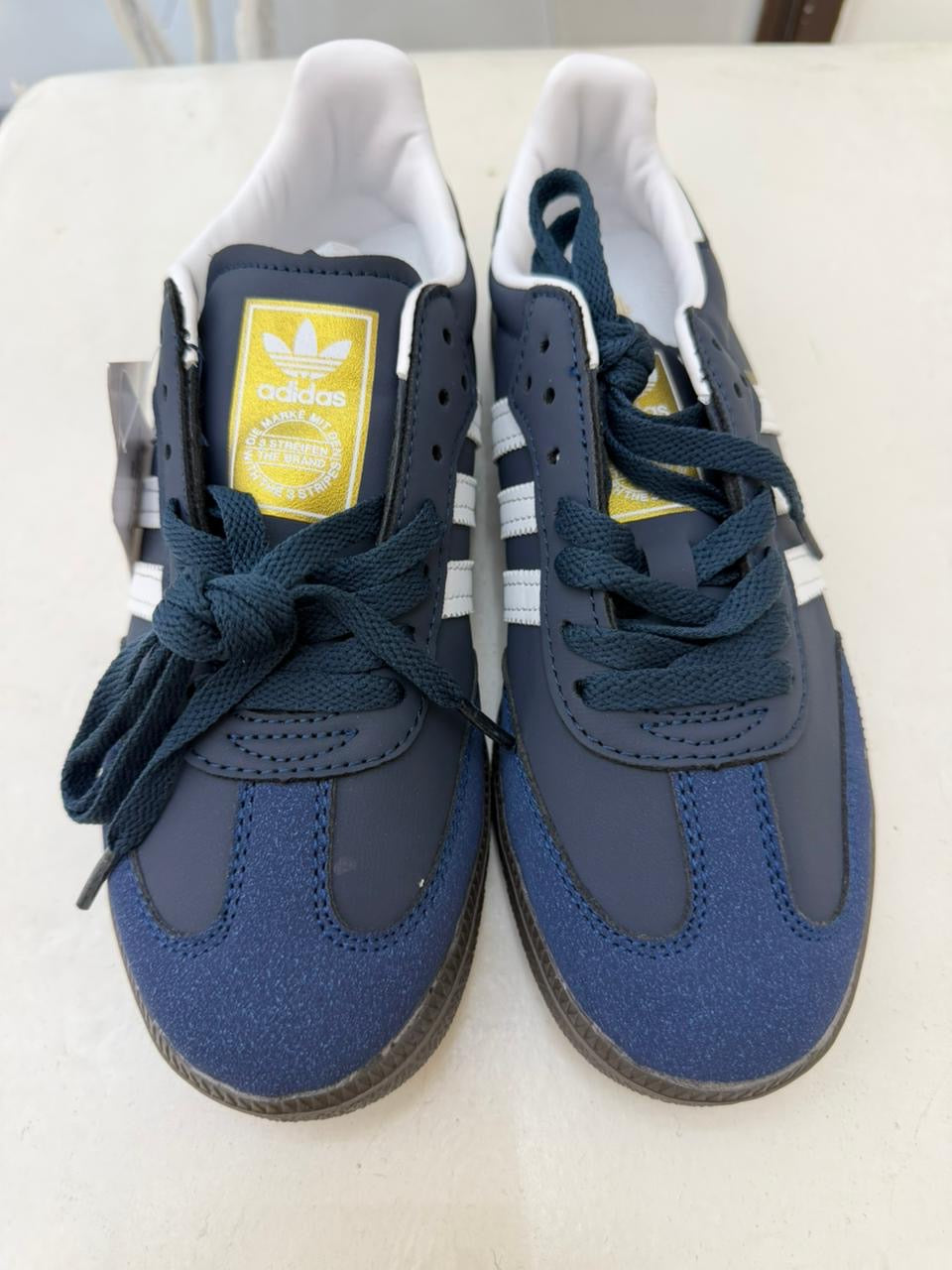 Samba sneakers in a navy blue colorway