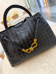 Black Bottega Veneta Andiamo handbag features the brand's signature Intrecciato woven leather