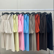 2-piece set features a ruffled camisole top and wide-leg palazzo pants.