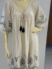 Primark white embroidered tunic dress with a tie up neck