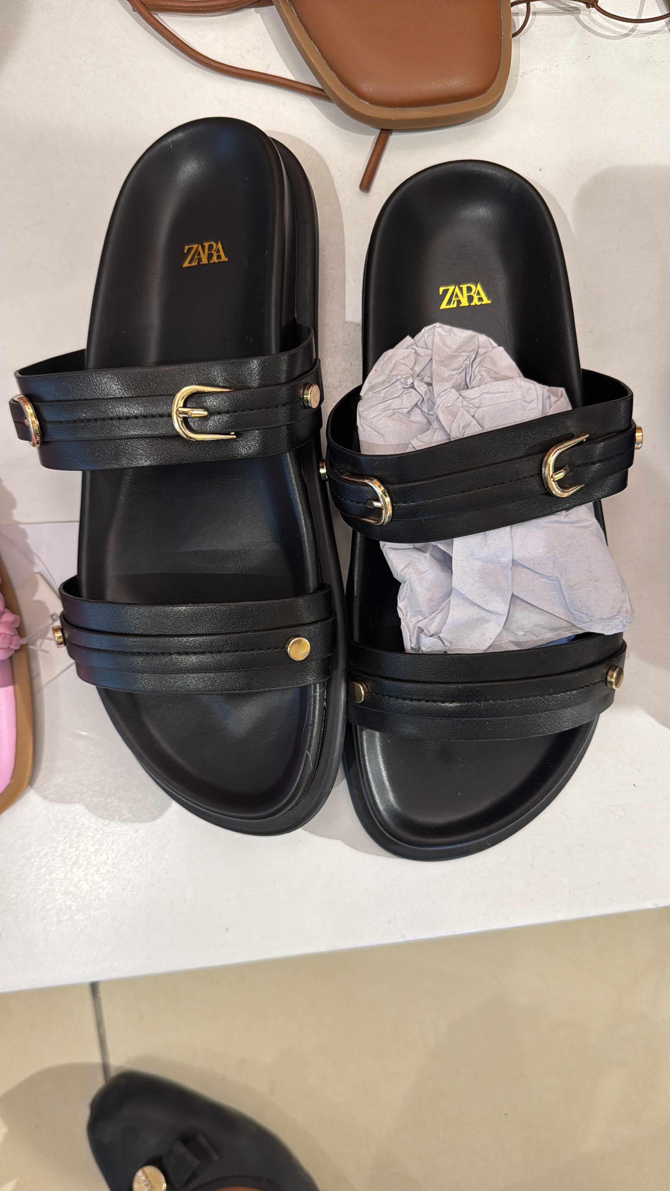 Zara black flat sandals with gold buckles