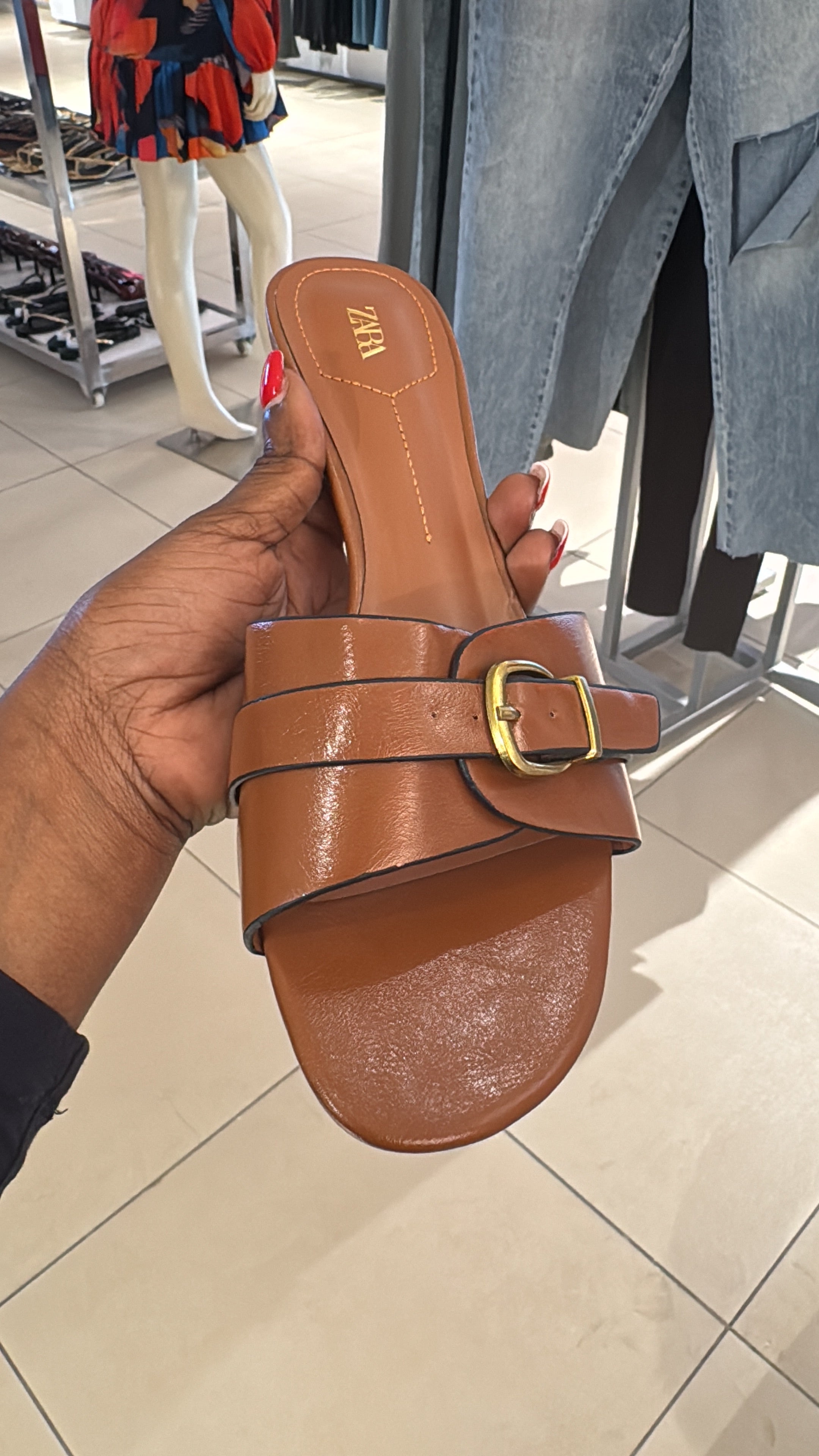Zara heeled with a front strap and buckled detail in brown