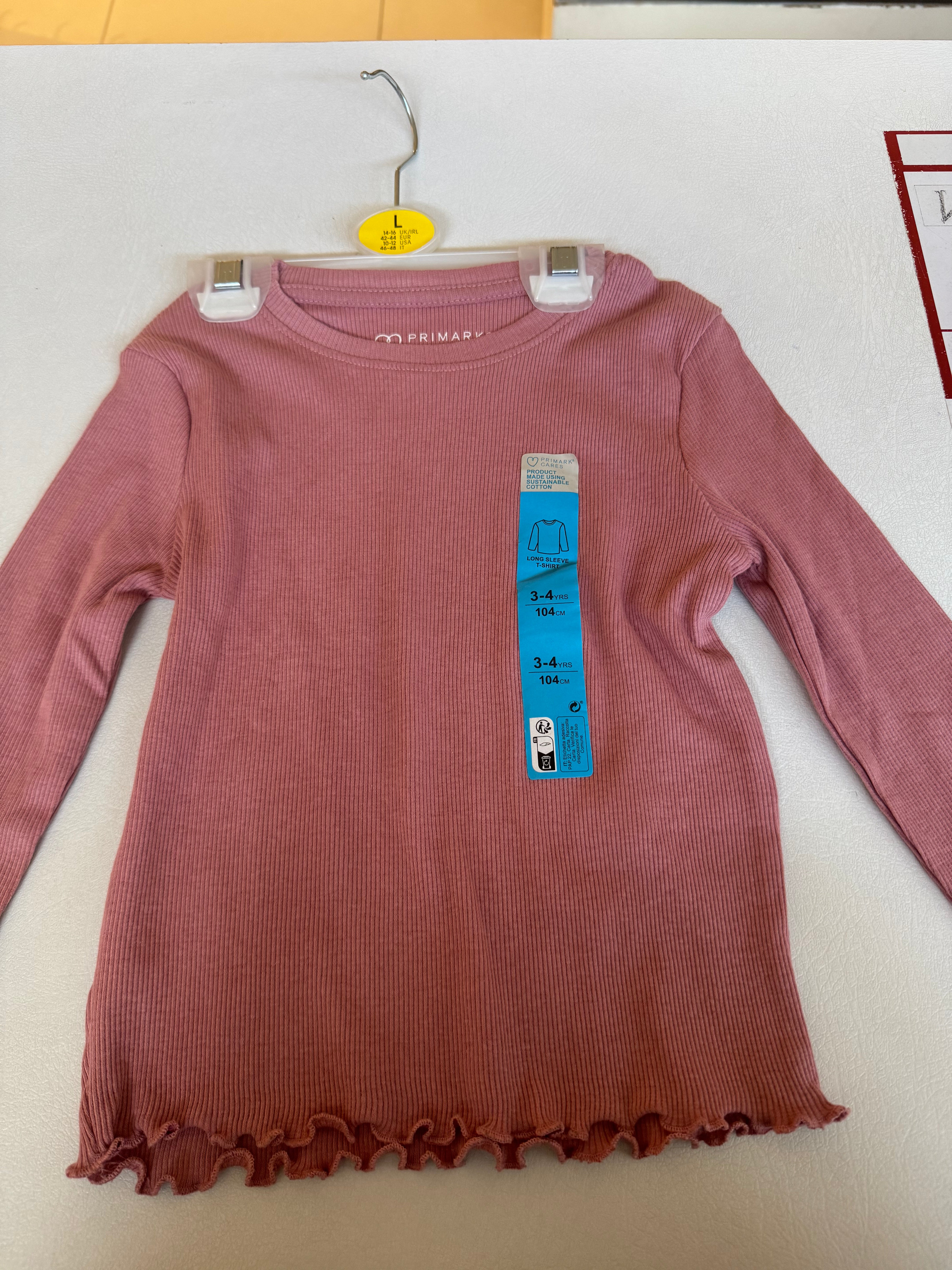 Primary long sleeved ribbed T-shirt with a ruffled hem