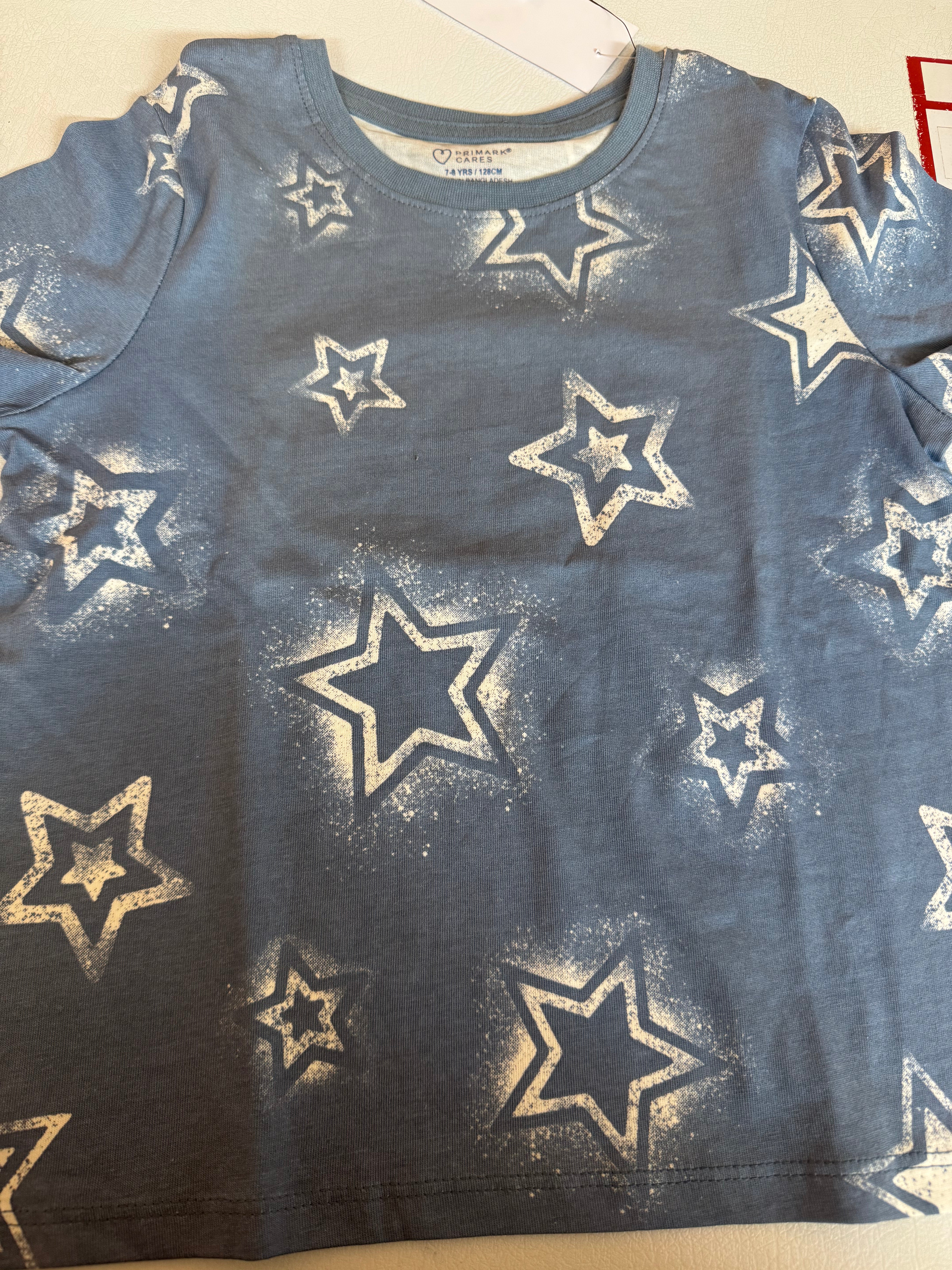 Primark kids t-shirts with a white star print