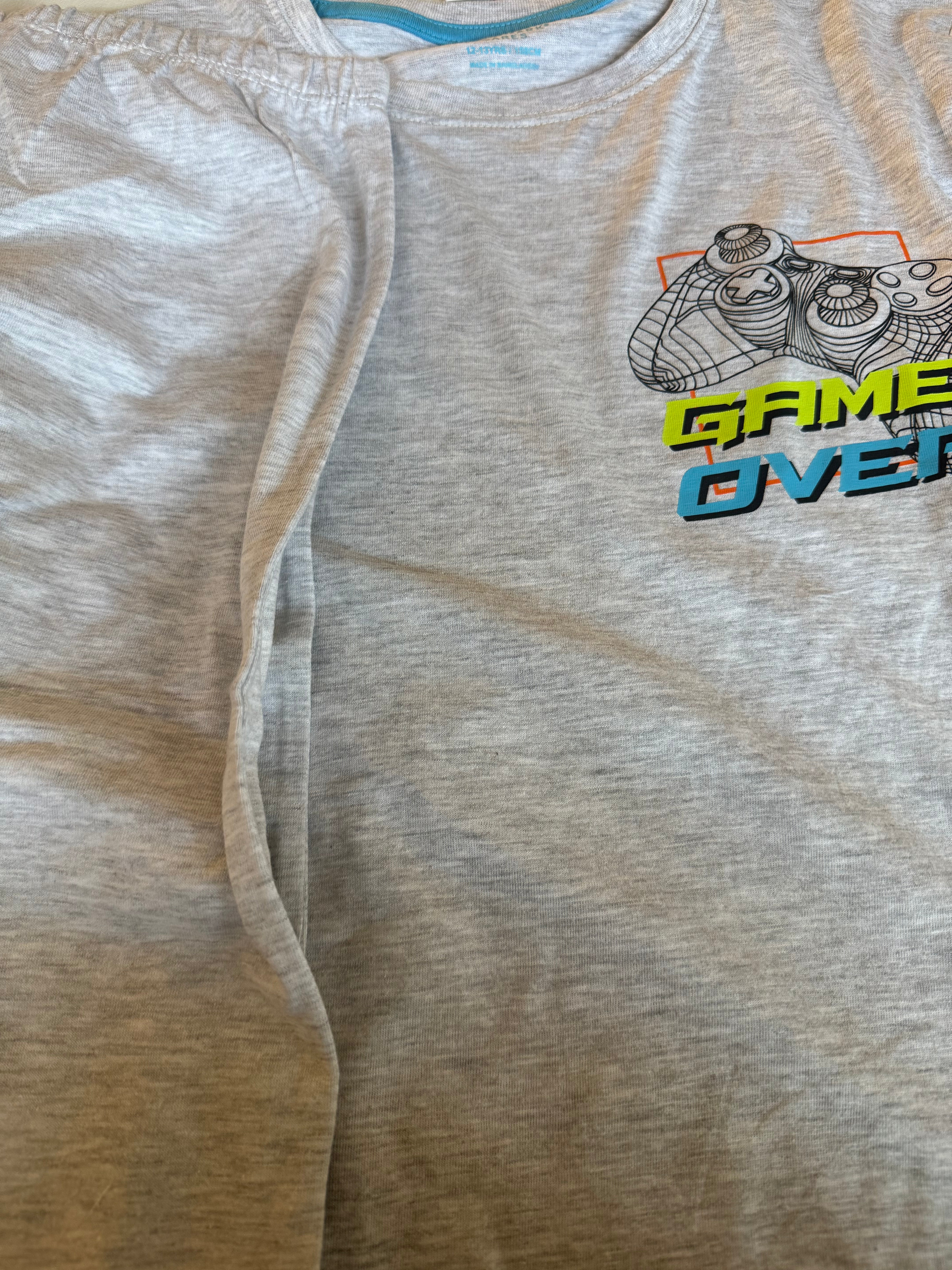 Primark cares mark children tshirt and jogger with a game over graphic