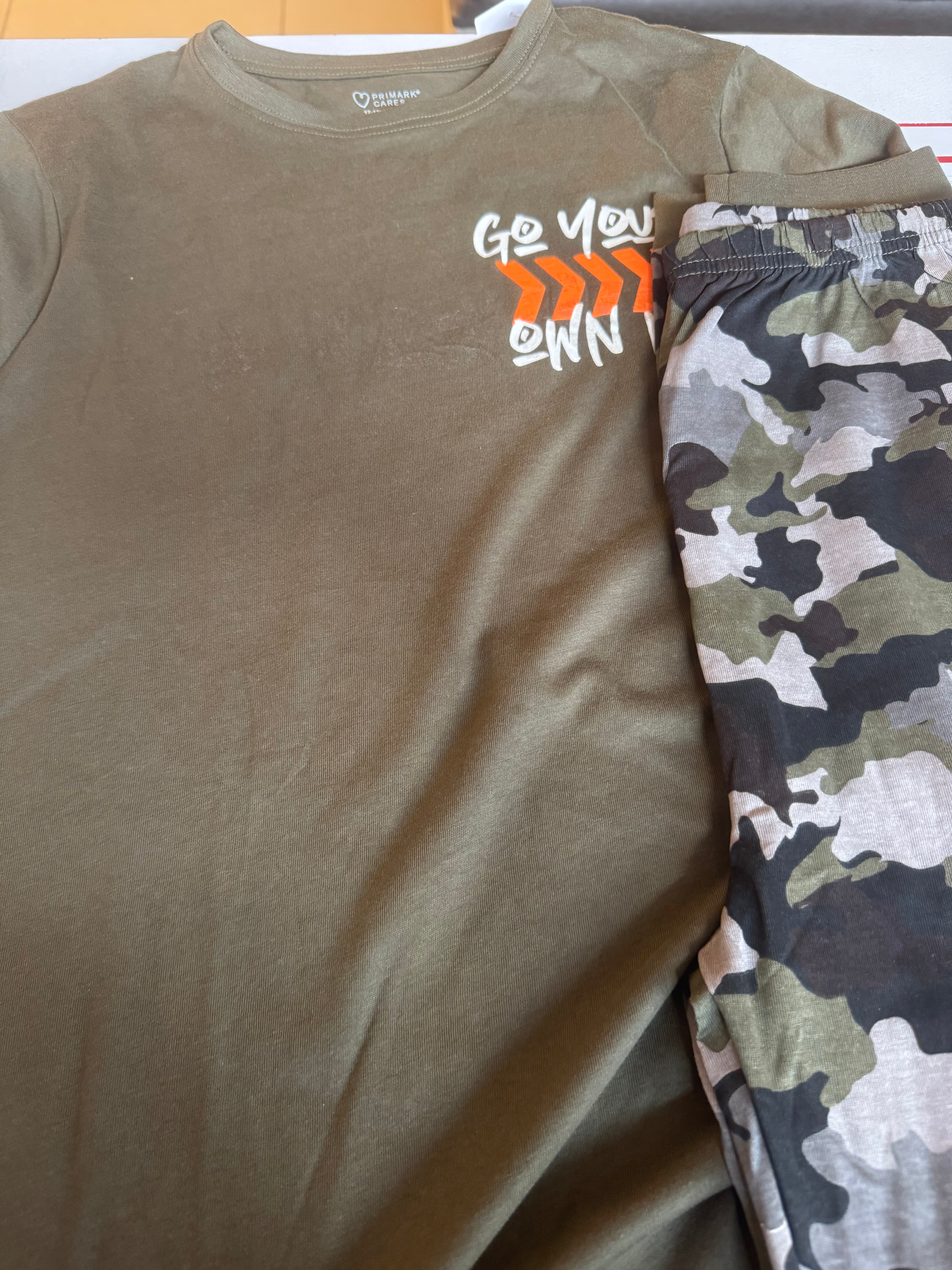 Primark olive tshirt and a camouflage pattern on the matching bottoms