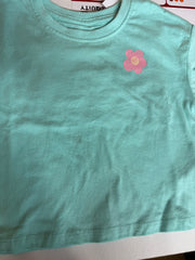 Primark care T-shirt with a daisy flower graphic on the chest