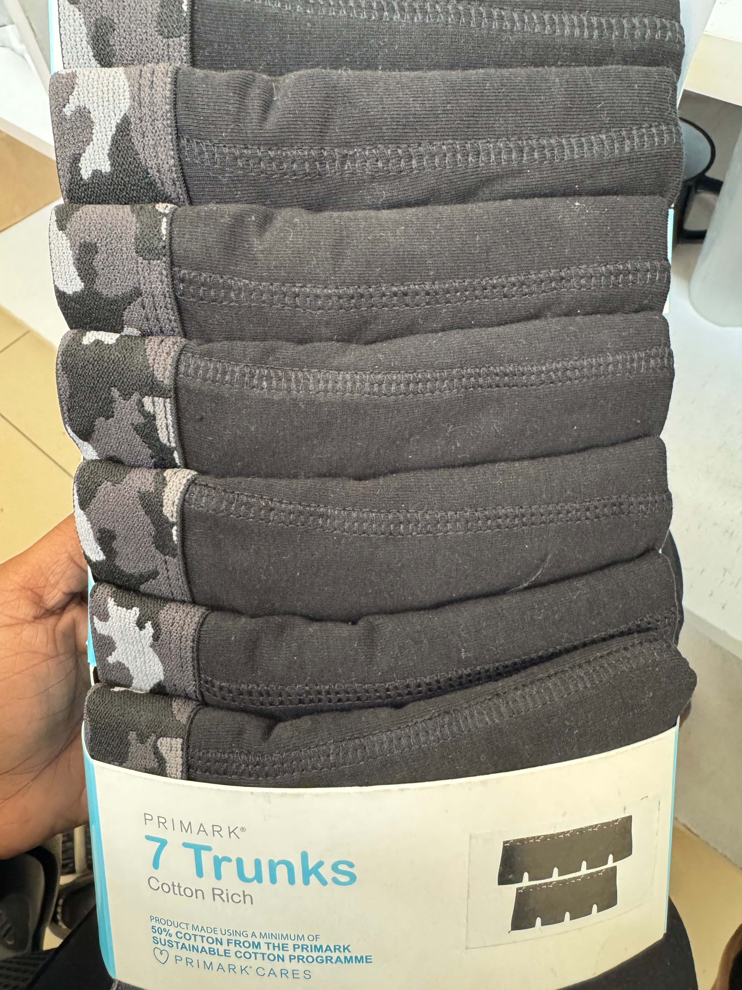 Primark 7 Trunks in black material with a camouflage waistband